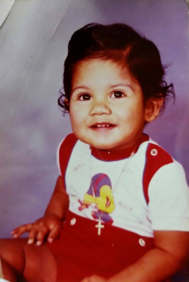 Young Angel Galindez near the water